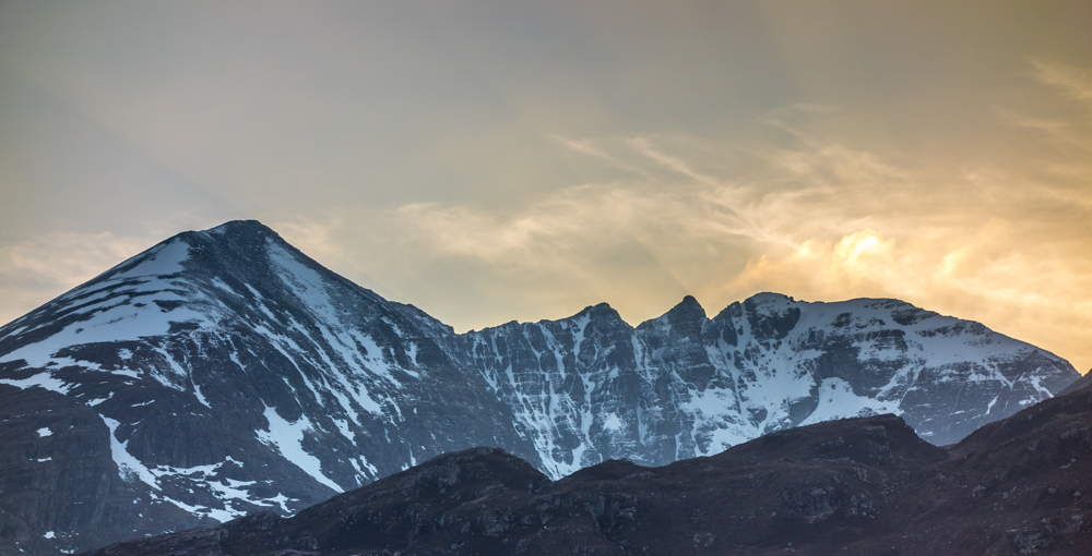 A spectacular send-off from a spectacular mountain as the sun goes down behind Coire Glas Tholl
