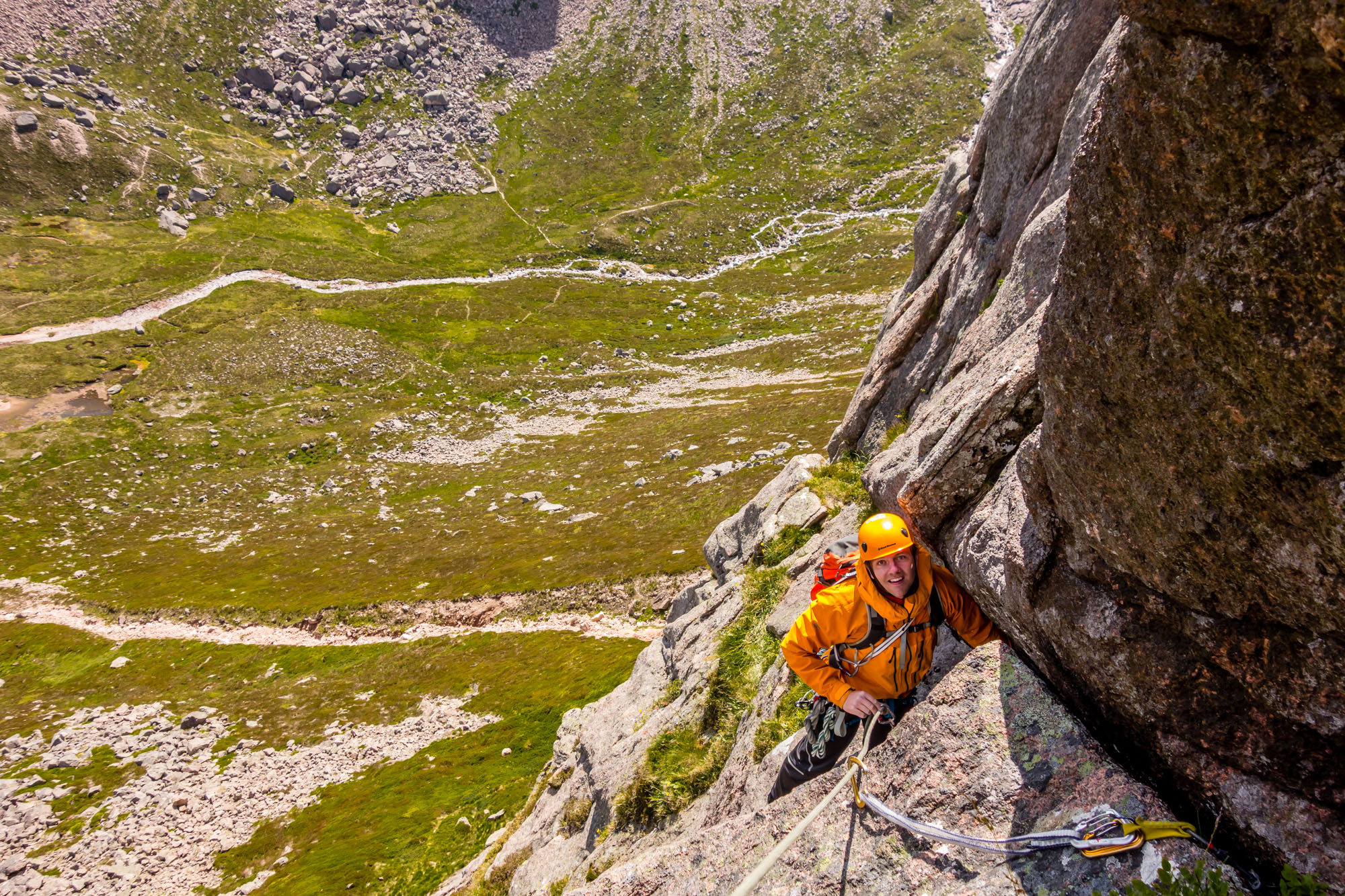 Ric following on the first traverse of pitch 4, trying to remain positive after witnessing a nasty fall below us.