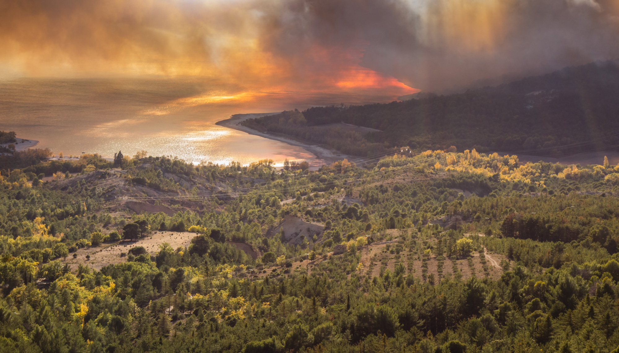 Smoke from the large forest fire near Felines lends an erie quality to the sunset on the first day