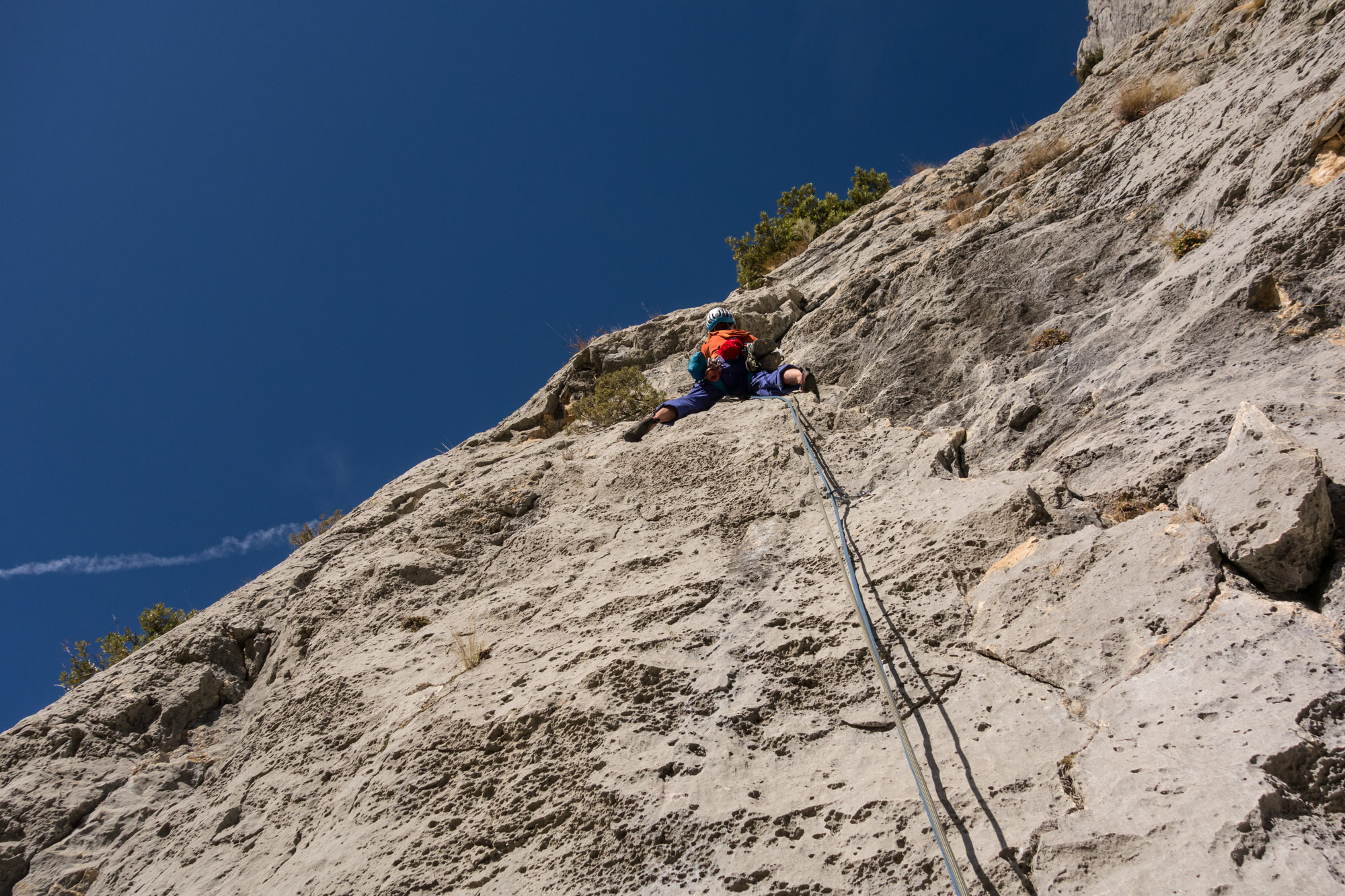 Immaculate rock, beautiful climbing and blazing sunshine - getting into the swing of things on the second pitch of Dalles Grises