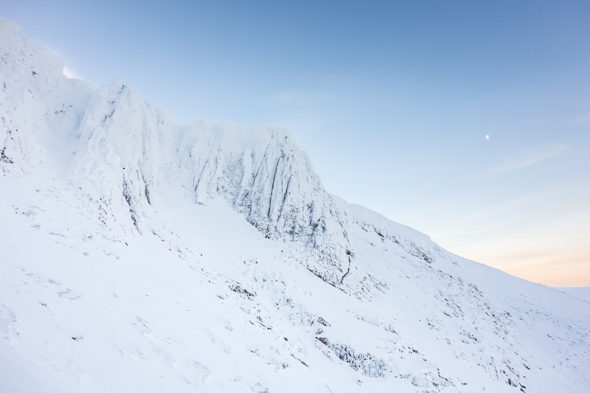 Beautiful colours as the moon sets and the sun rises. The cleaned lines of Savage Slit (V, 6) and Fallout Corner (VI, 7) easily seen on No4 Buttress.
