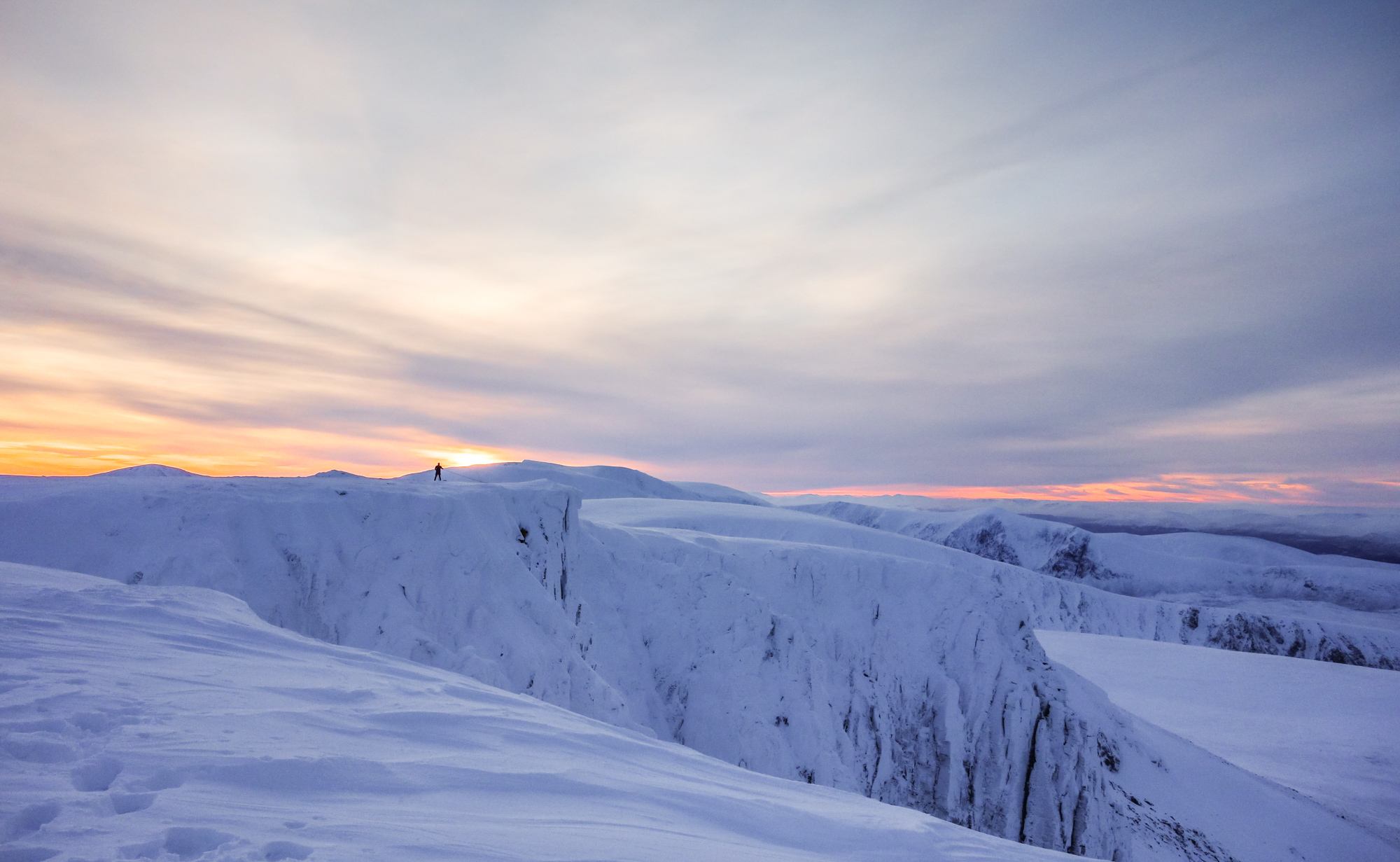 On the summit of Cairn Lochain at dusk, with yet more spectacular colours. Not a bad way to end the day! Photo credit: Andy Inglis.