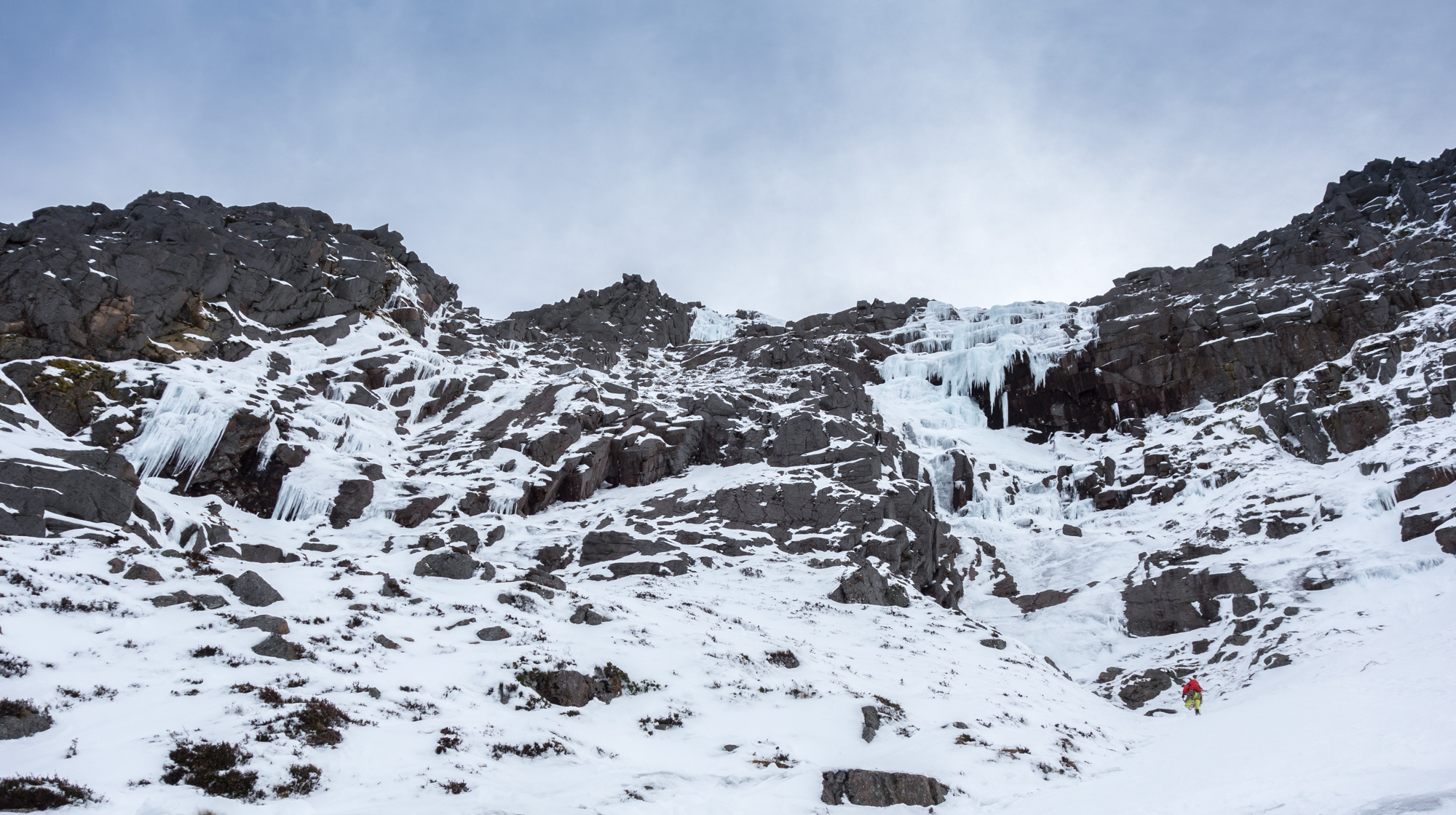 Joe approaching the start of Window Gully. The upper icefall of K9 can just be seen in the centre of the photo.