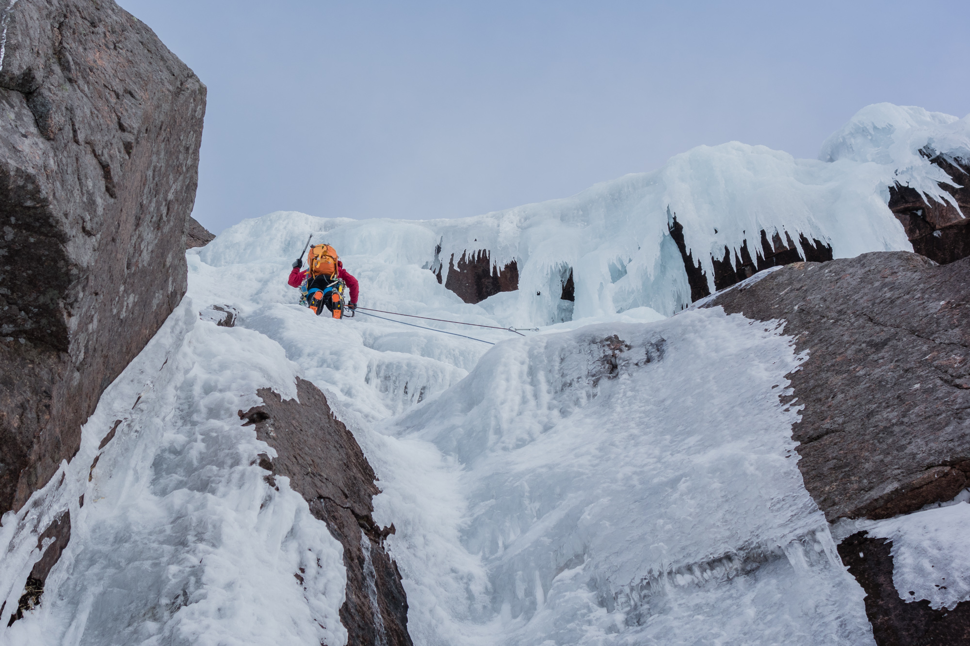 Andy approaching the final steepening after a rising traverse on slightly worrying ice. Photo credit: Joe Dobson