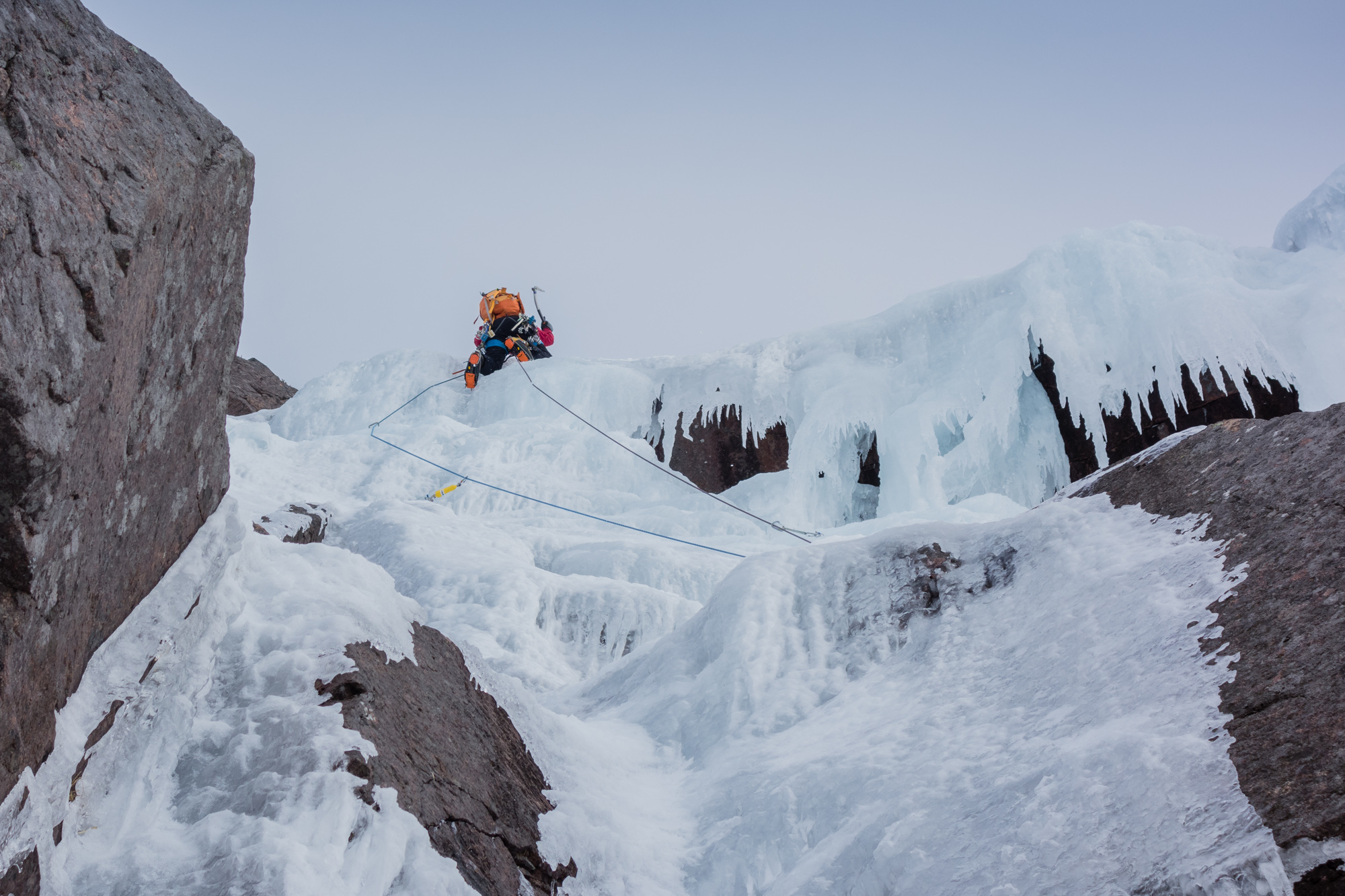 Andy pulling the final bulge on the crux second pitch - good ice where we needed it! Photo credit: Joe Dobson