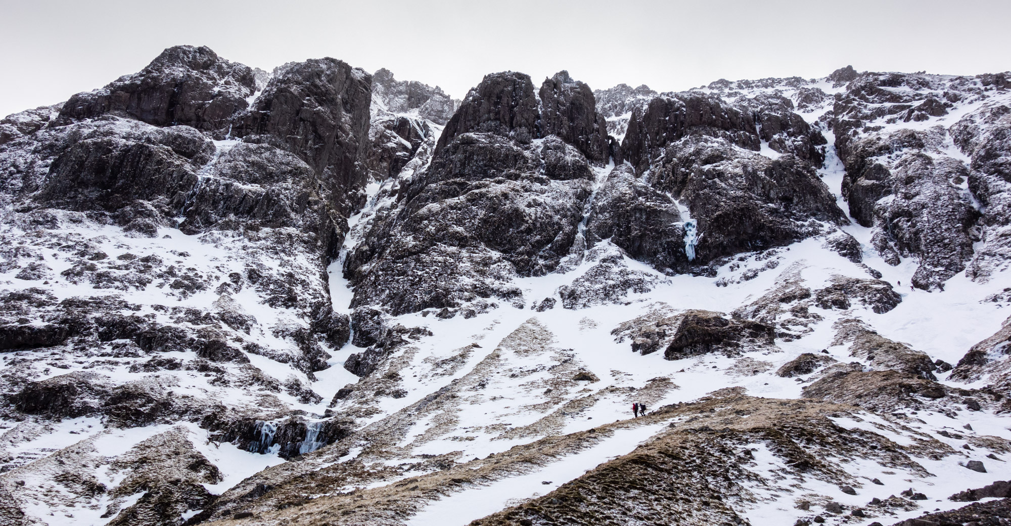 The complex West Face of Aonach Dubh with the obvious rift of No4 Gully centre-left and No6 Gully on the far right