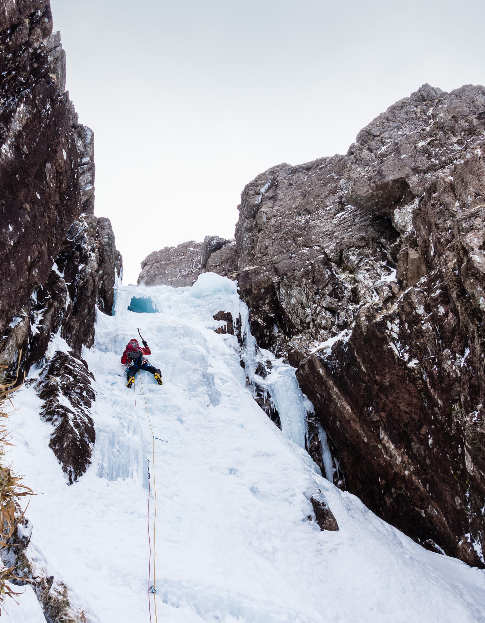 The crux pitch was stepped out but interest was maintained by the variable ice quality and the need to pull funky shapes to bypass the ice umbrella at the top. Photo credit: Ric Hines